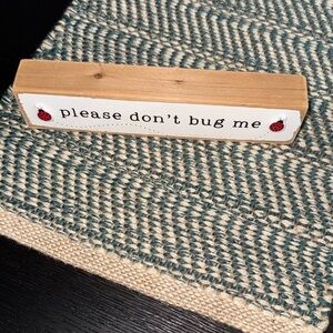 Wooden Sign with Ladybug Design